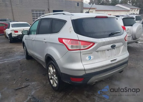 2015 Ford Escape Titanium z USA, uszkodzony, nr VIN 1FMCU9J99FUA75618